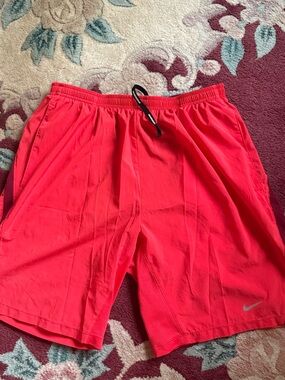 Nike Red Men's Athletic Shorts with Dark Stripe